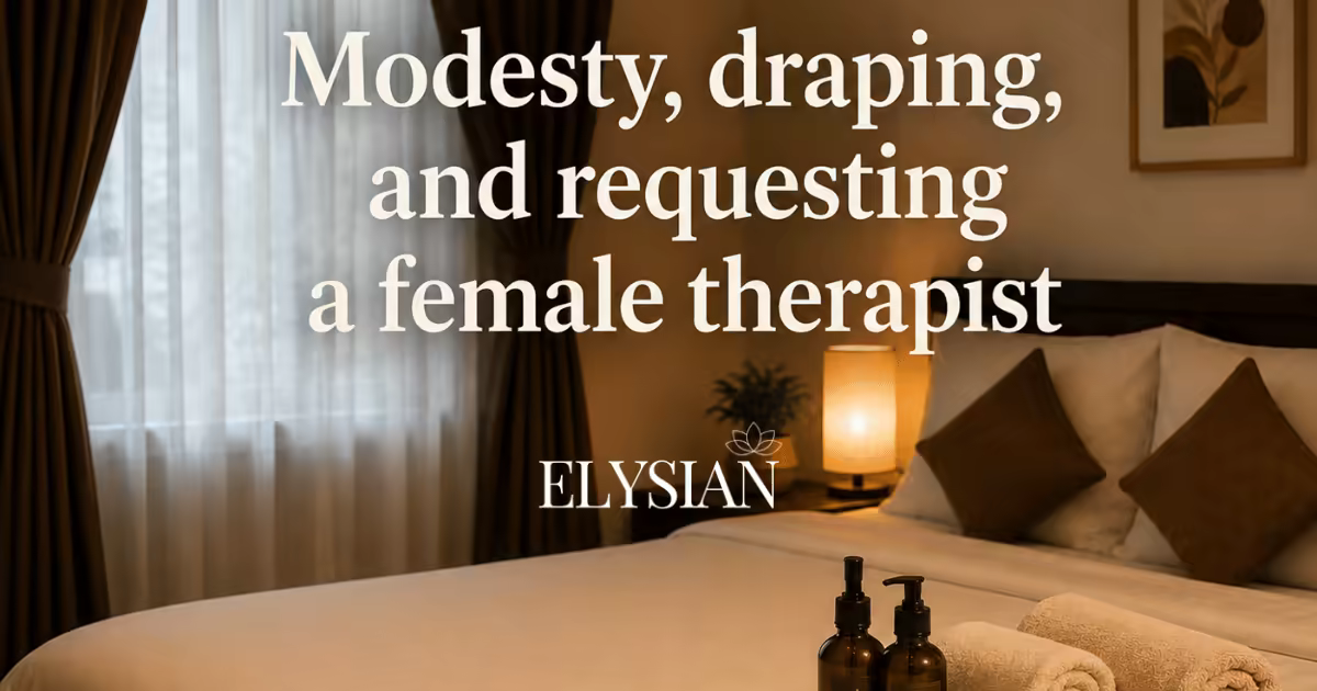 A calm, private in-room massage setup with fresh towels and oils in a Bangkok hotel room