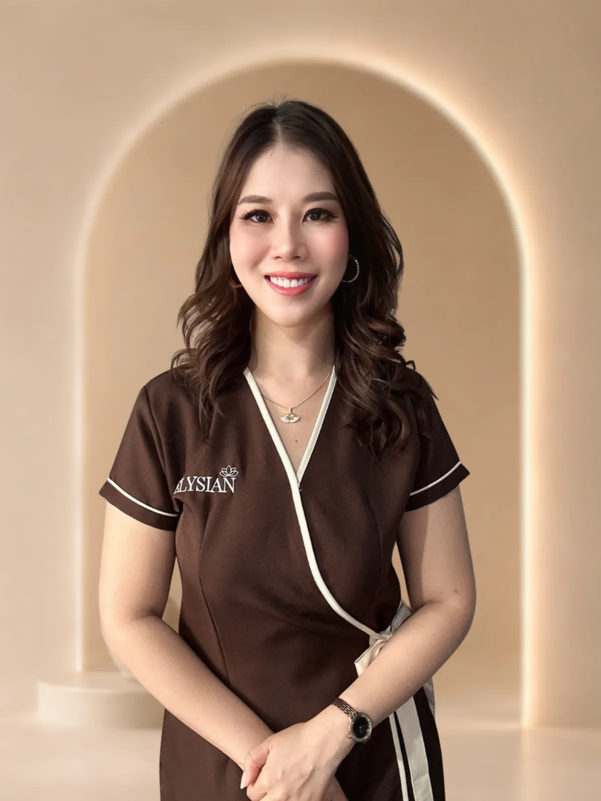 Momay, licensed Thai massage therapist at Elysian